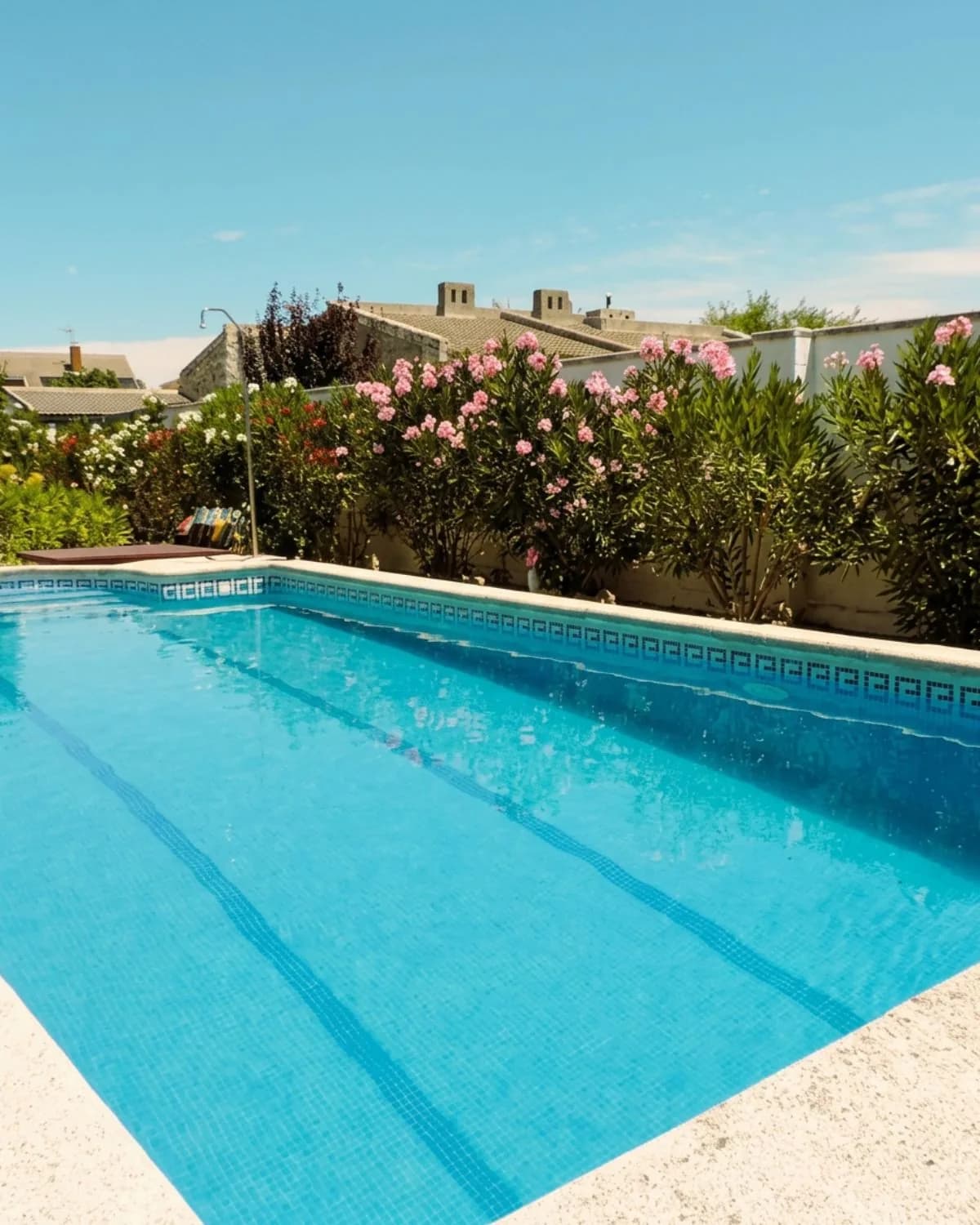 Outdoor area with pool and barbecue zone
